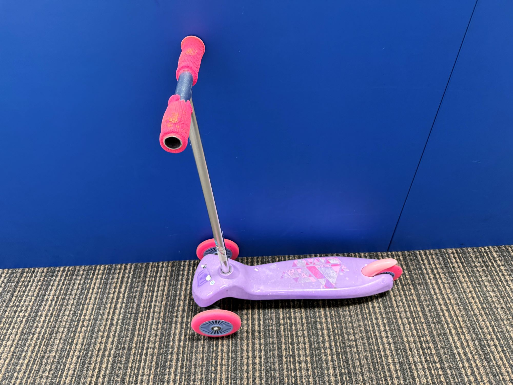 Pink and purple 3 wheel scooter